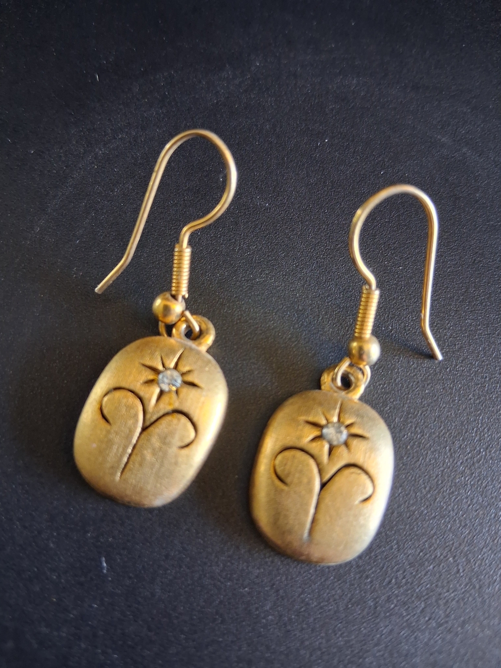 Brushed Gold Aries Zociac Sign Drop Earrings With Center Star Crystal.